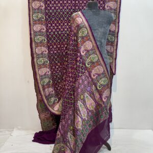 Here’s a premium-style product description for your **Purple Rai Bandhani Tested Zari Saree**: --- **Royal Purple Rai Bandhani Saree with Tested Zari Work** Step into timeless elegance with this exquisite **Rai Bandhani saree**, handcrafted in a deep royal purple hue. The body features intricate **tie-and-dye patterns** in vibrant green, pink, and red, forming traditional geometric motifs. The **luxurious tested zari border** is adorned with grand paisley and floral designs, intricately woven in gold and pastel shades, adding a regal touch. The pallu showcases elaborate artistry, blending **Bandhani patterns** with rich zari embroidery for a statement look. Perfect for weddings, festive occasions, and grand celebrations, this saree is a true fusion of **heritage craftsmanship** and **opulent design**. * **Fabric:** Soft georgette/silk blend * **Technique:** Rai Bandhani hand tie-dye * **Work:** Tested zari with paisley & floral motifs * **Colour:** Royal purple with multicolour highlights * **Occasion:** Bridal, festive, and cultural events --- If you want, I can also make a **short, catchy social media caption** for selling this saree online. It would grab buyers’ attention instantly.