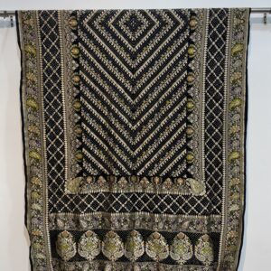 Traditional Rai Bandhej work with intricate patterns and zari detailing
