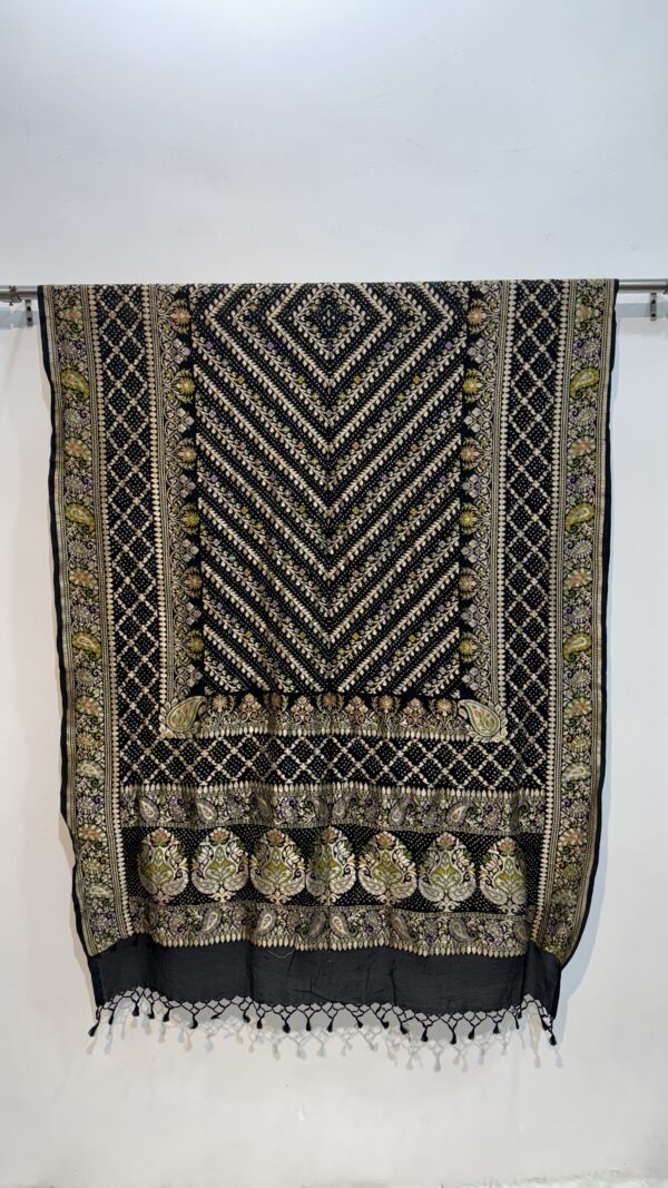 Traditional Rai Bandhej work with intricate patterns and zari detailing